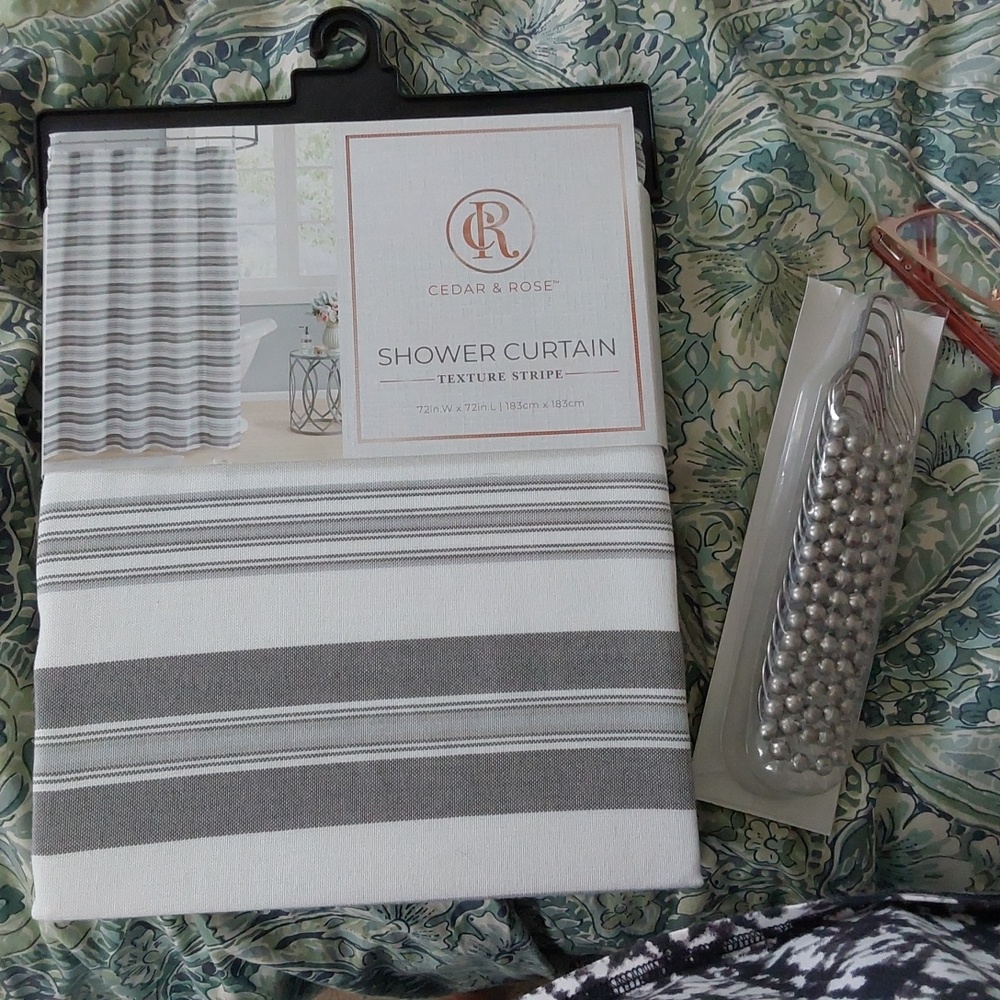 nwt white and grey striped shower curtain and rings. Never out of package